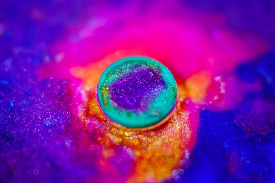 Sparkling Balls of Paint and Glitter Explode and Absorb in a New ...