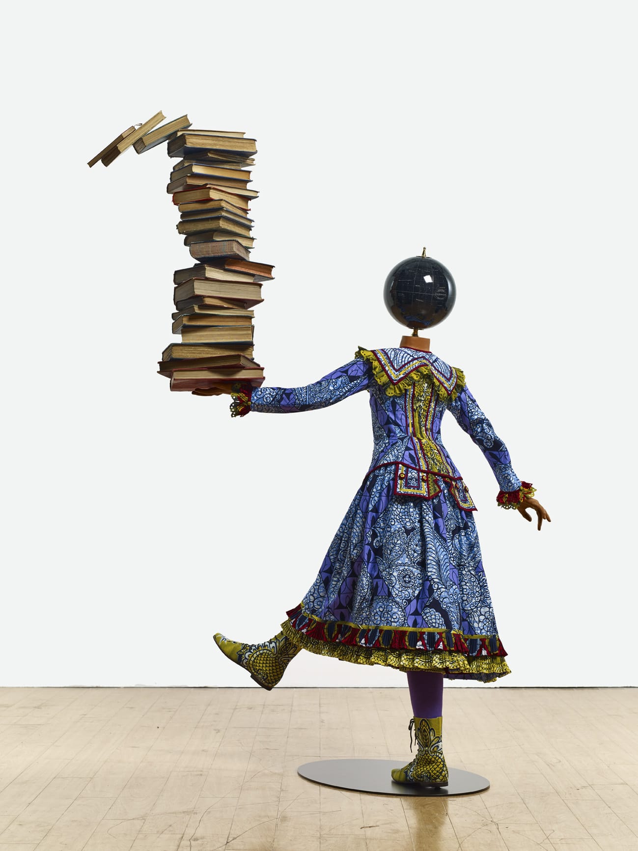 Globes And Astronaut Helmets Form Heads Of Figurative Sculptures By 