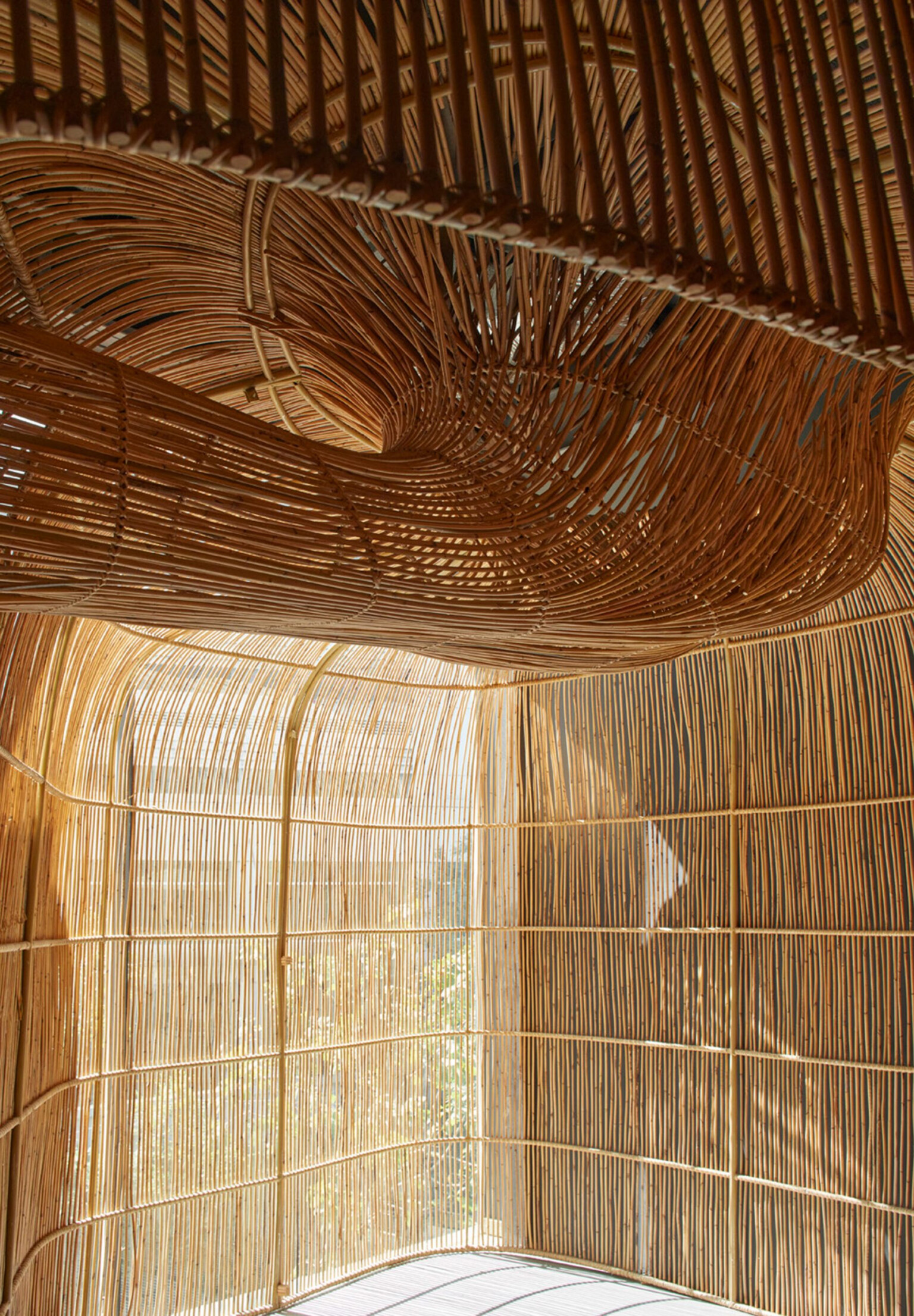 Ata Rattan Building Inspiration Built From Rattan, A Sinuous Structure Houses a Yoga Sanctuary in ...