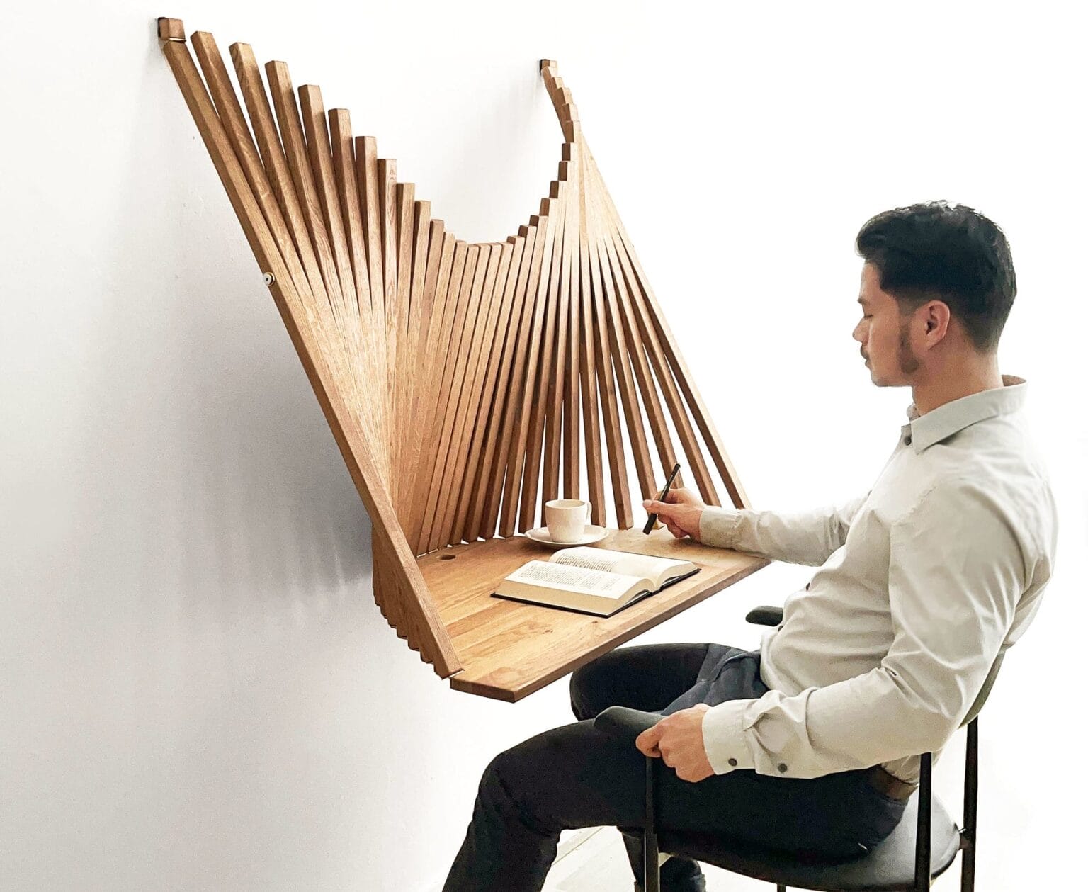 A Wooden Artwork Miraculously Unfurls into a Functional Desk Designed ...