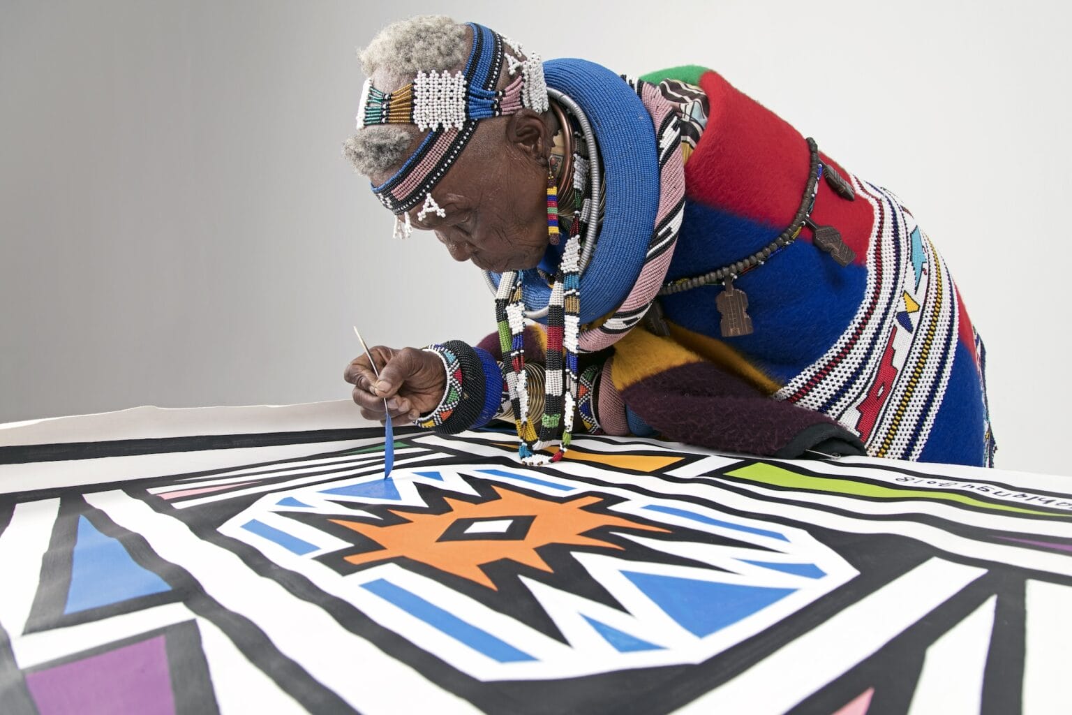 A Vibrant Ndebele Mural By Esther Mahlangu Illuminates Unity At a-vibrant-ndebele-mural-by-esther-mahlangu-illuminates-unity-at