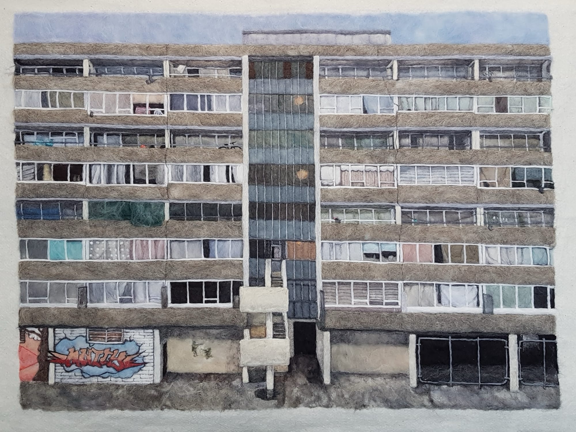 a textile piece depicting public housing