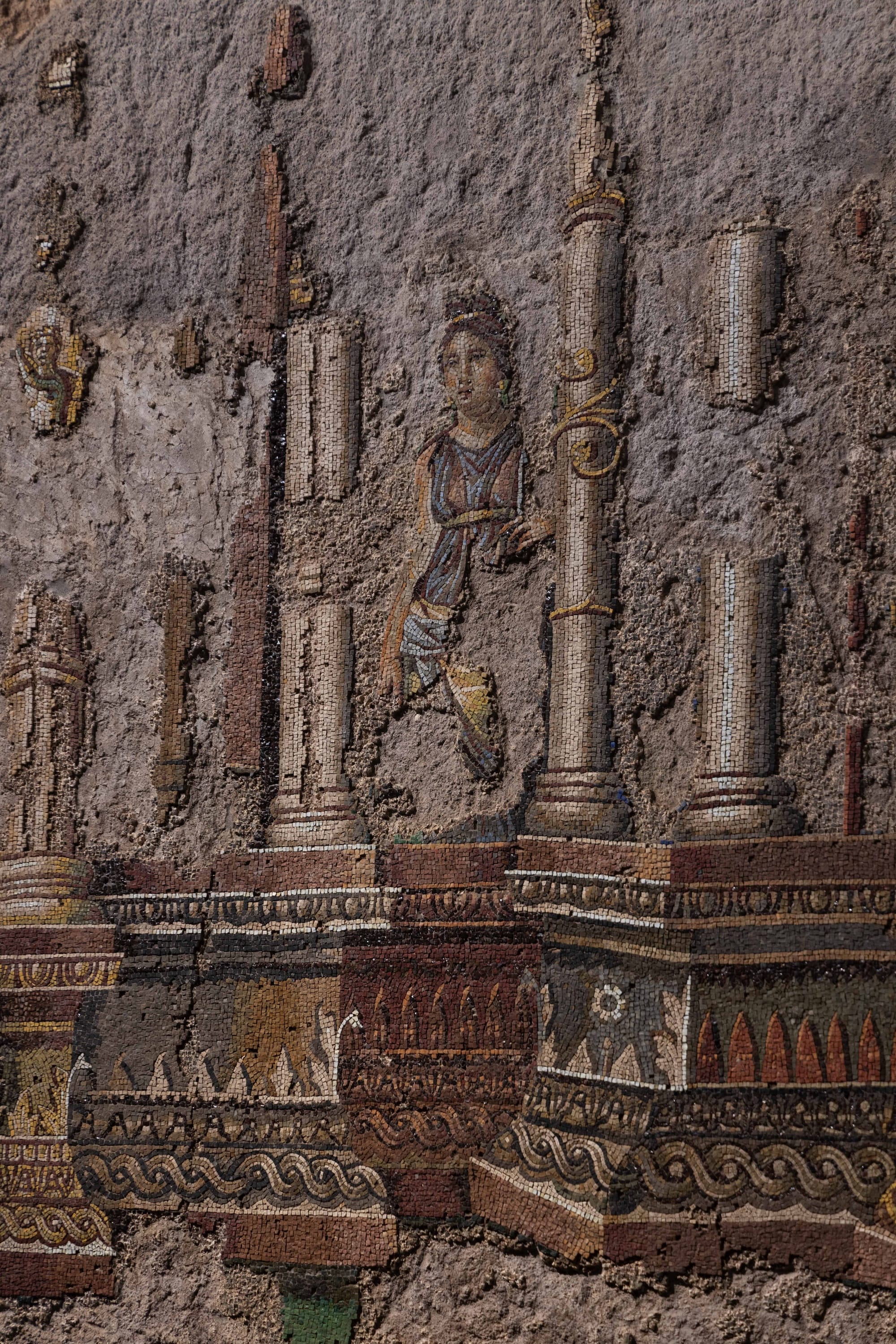 fragments of a conserved ancient Roman mosaic, in situ underground where it was discovered in Rome
