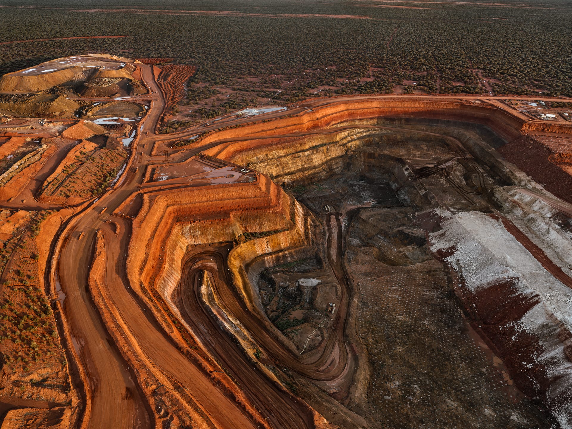 an aerial photo by tom hegen of a vast mining landscape 