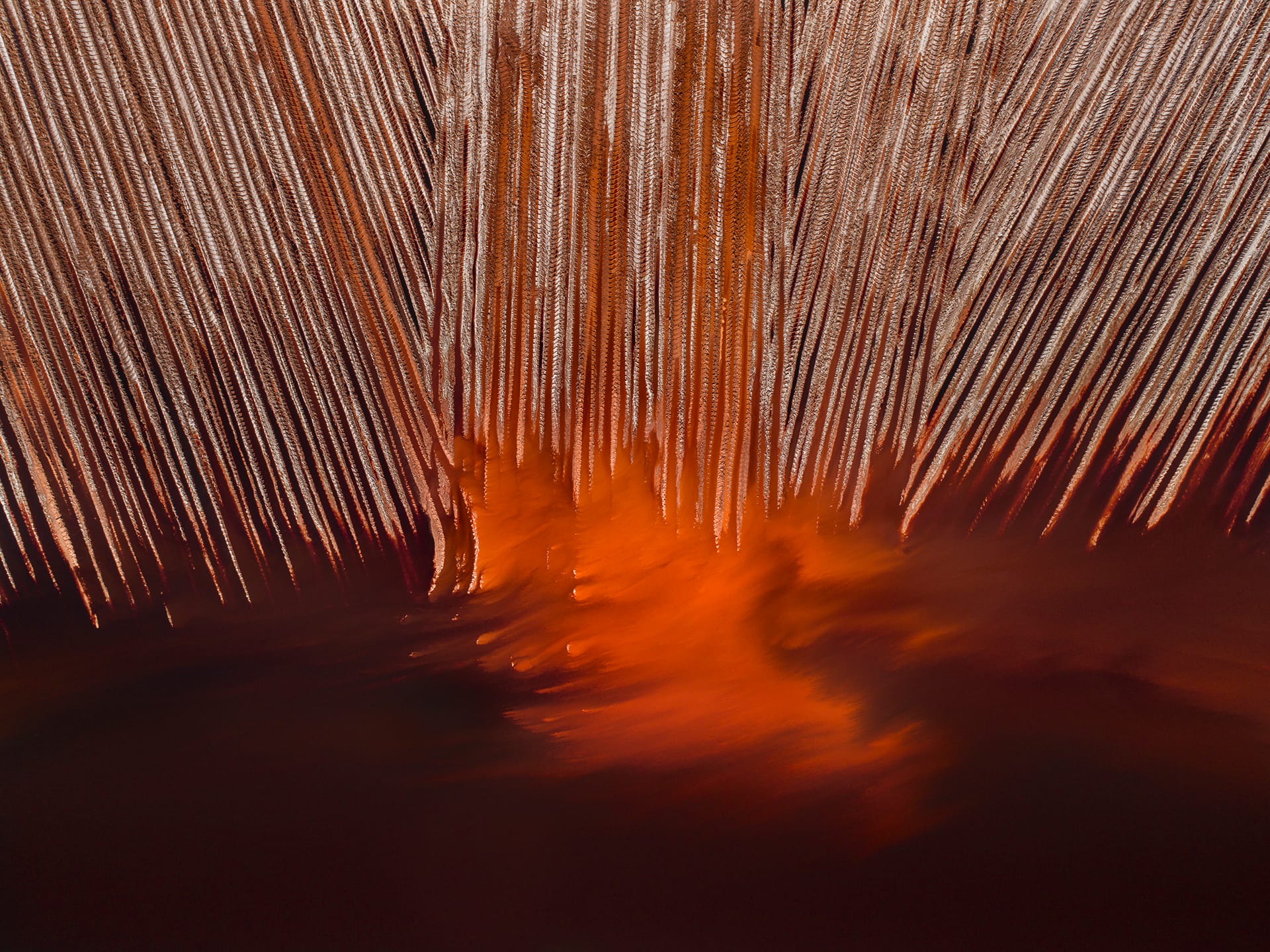 an aerial photo by tom hegen of a vast mining landscape 
