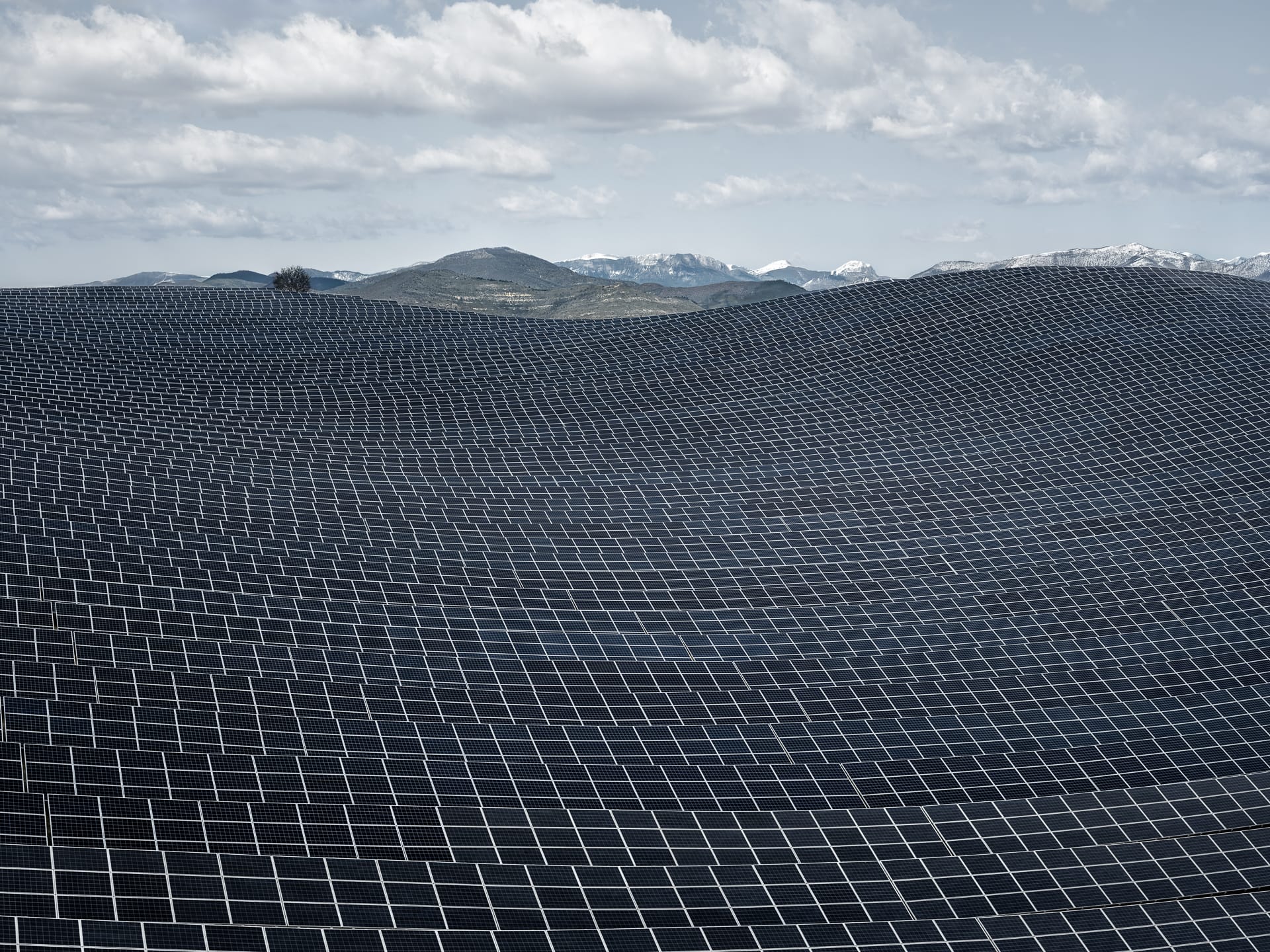 an aerial photo by tom hegen of a vast sea of panels