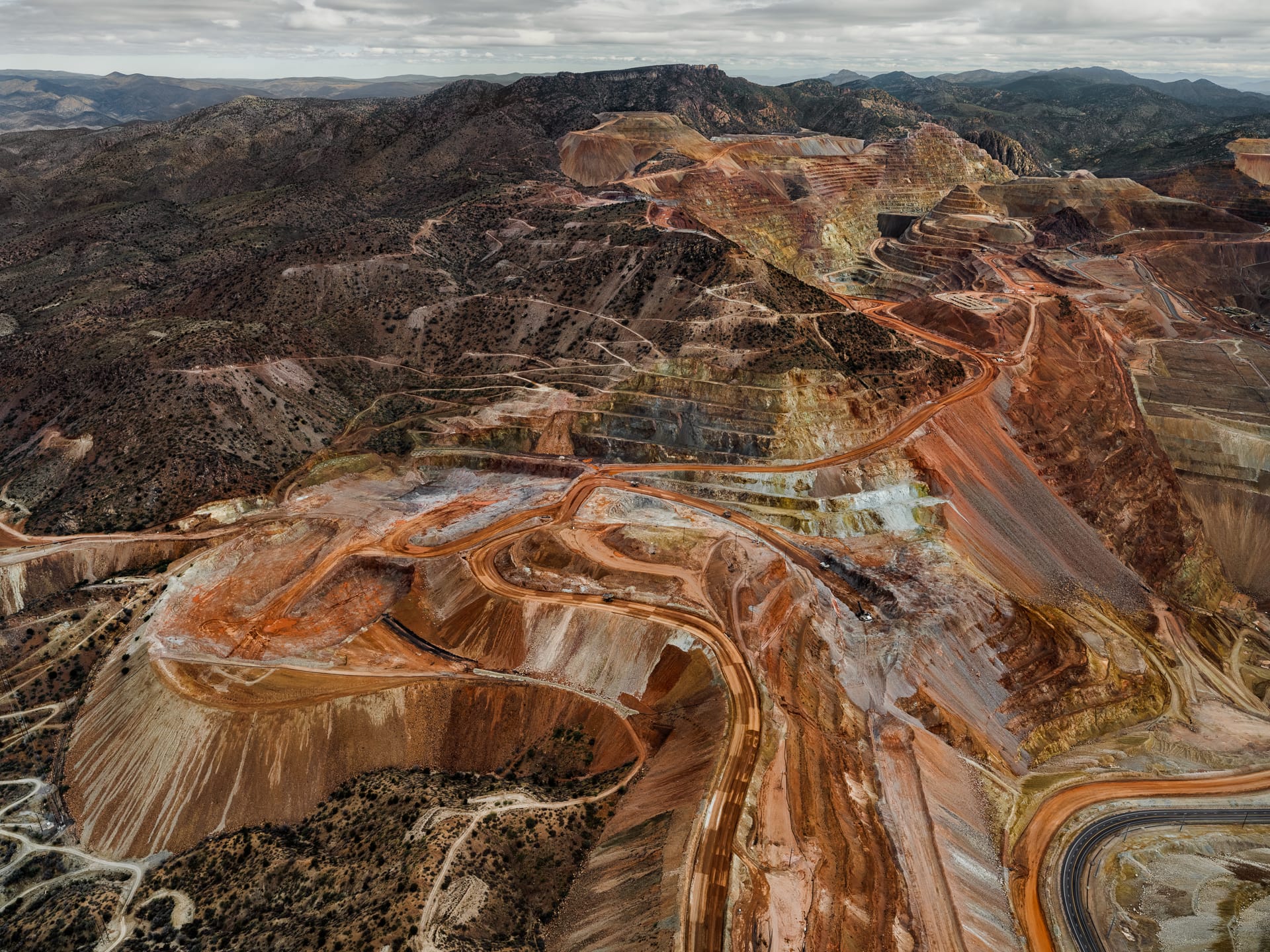 an aerial photo by tom hegen of a vast mining landscape 
