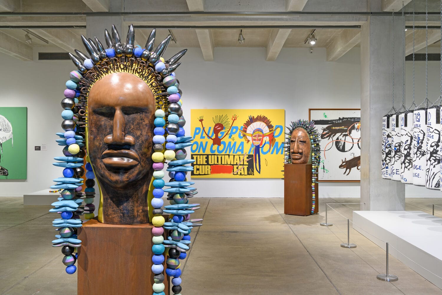 installation view of a show of sculptures and paintings by Sharif Bey