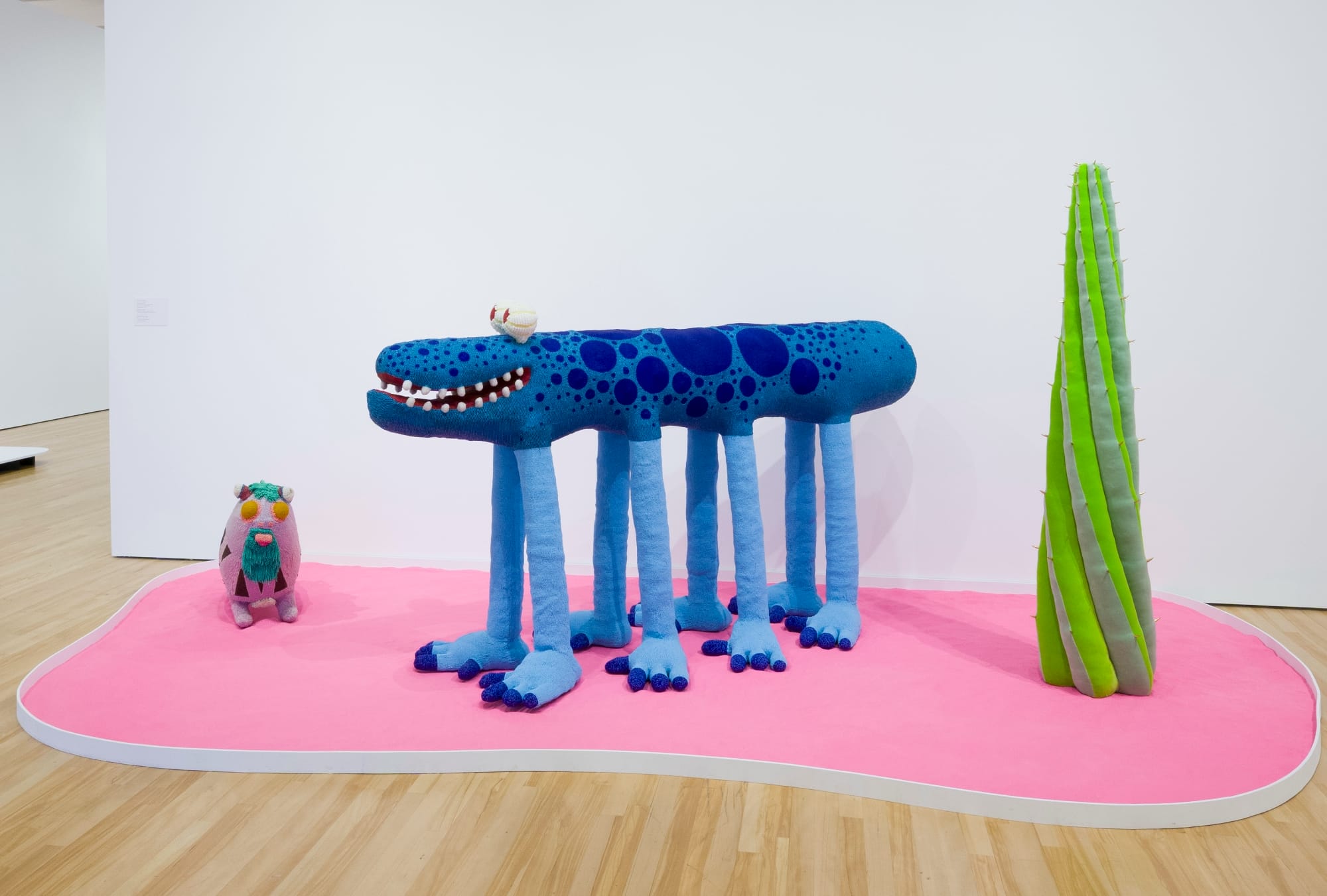 fantastical creatures by the haas brothers on a pink pedestal