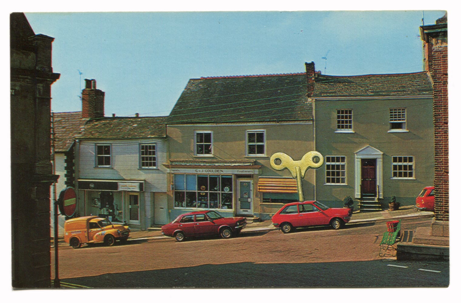 a painting by Rose Sanderson on a vintage postcard of a wind up mechanism on a car